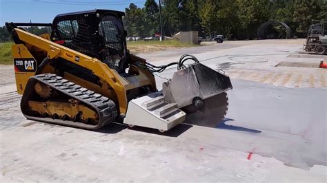 hot saw for skid steer|skid steer mounted concrete saw.